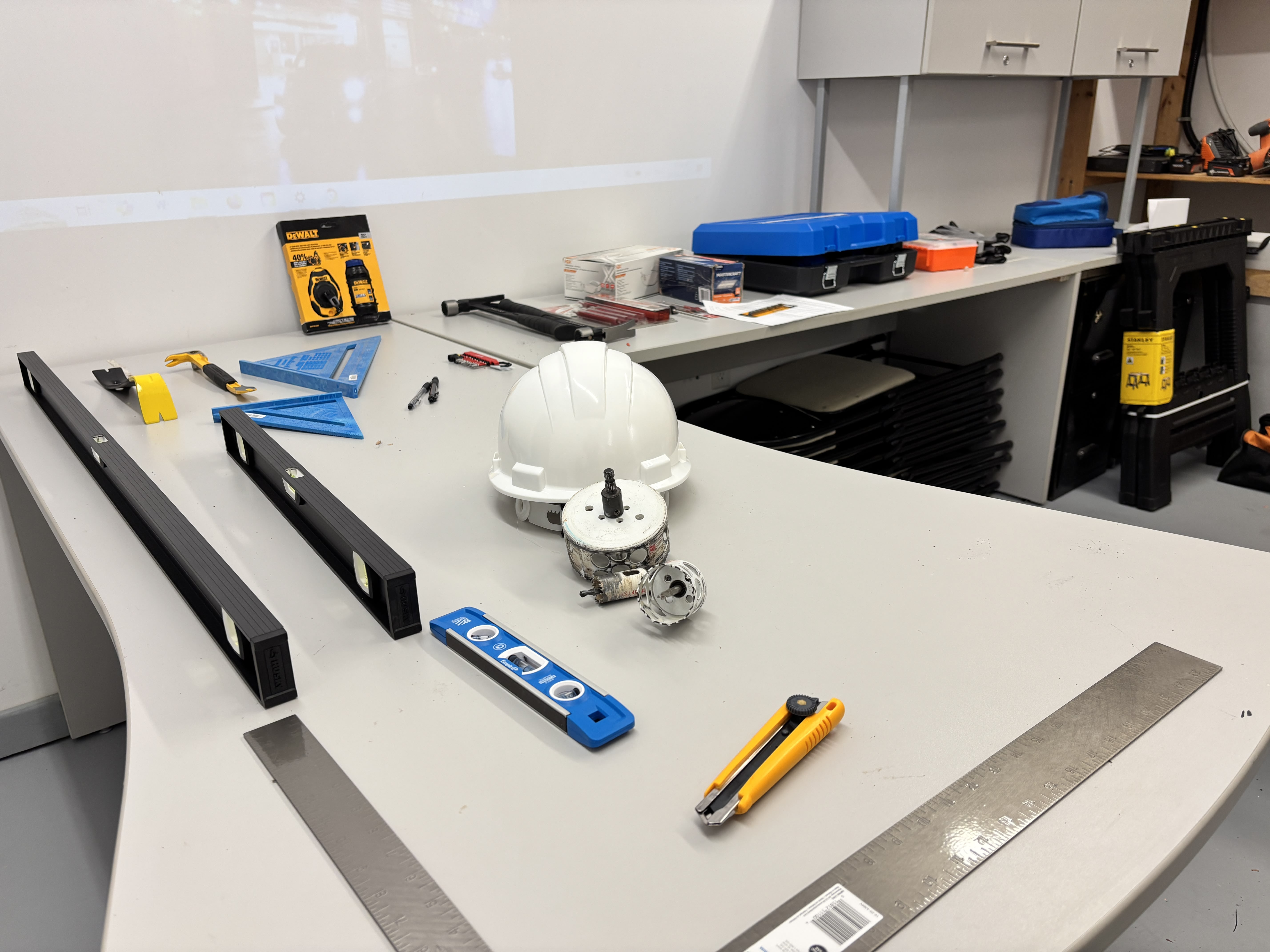 Construction tools laid out in training classroom